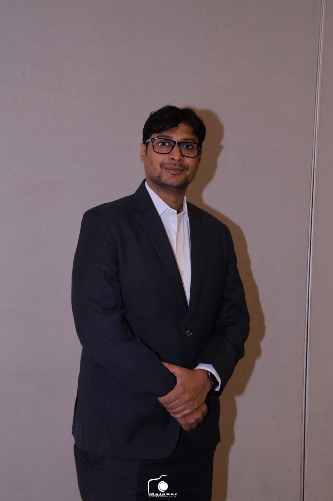 Saket Saraf in professional attire